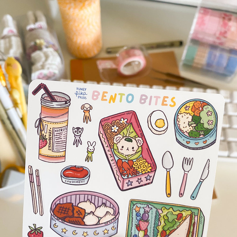 
            
                Load image into Gallery viewer, Bento Bites Sticker Sheet From Kioni Huney Pika Press Sakura Festival-1
            
        