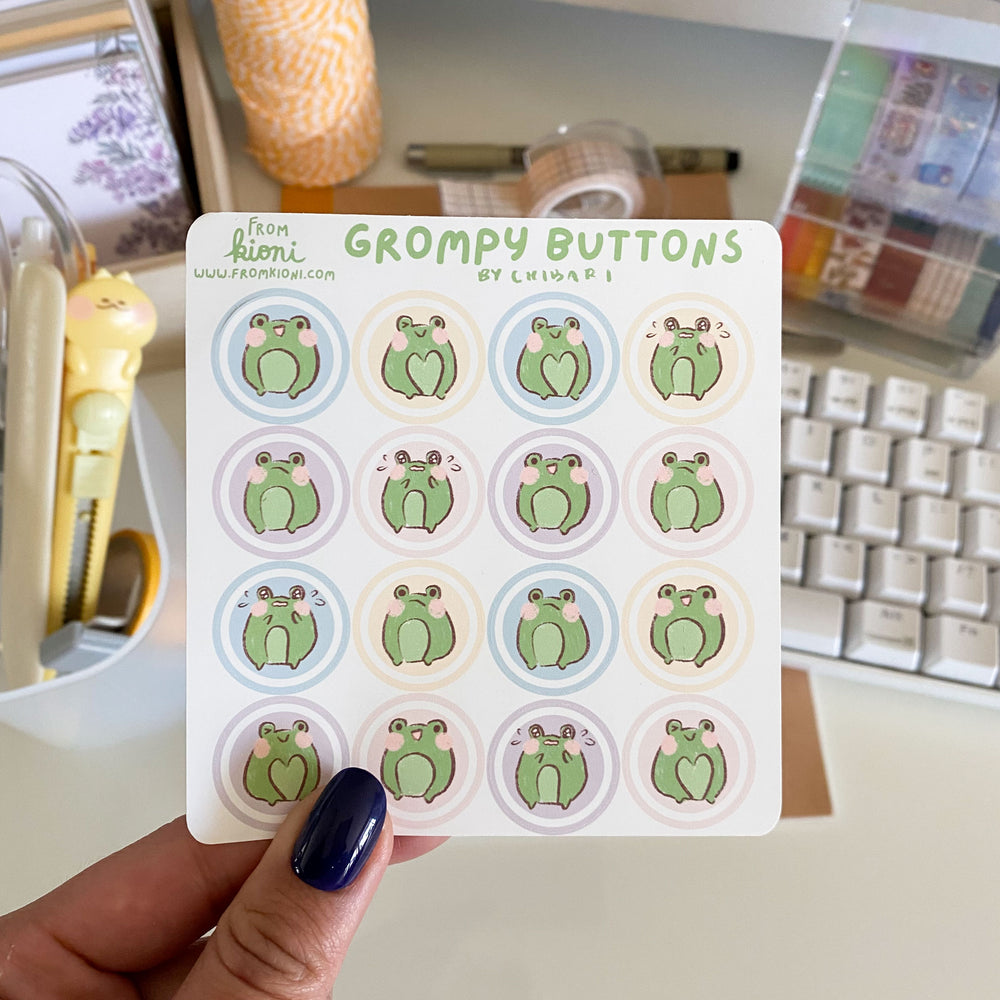 
            
                Load image into Gallery viewer, From Kioni Chibari Spring Collection Grompy the Frog Buttons Sticker Sheet
            
        