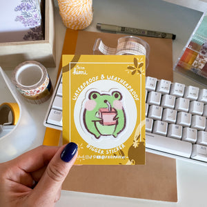 
            
                Load image into Gallery viewer, From Kioni Spring Collection Chibari Grompy the Frog Juice Box Bigger Sticker, 1.75x2 in.
            
        