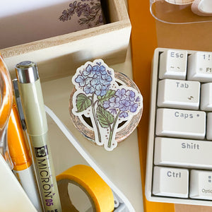 
            
                Load image into Gallery viewer, From Kioni Spring Collection Huney Pika Press Hydrangea Bouquet Bigger Sticker, 1.75x2.25 in.
            
        