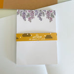 From Kioni Spring Collection Huney Pika Press Wisteria Notepad, 4x5.5 in.